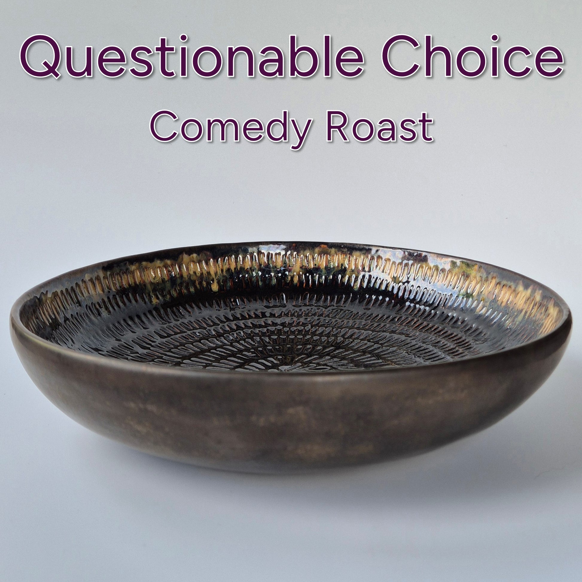 Brown ceramic bowl on a light gray background with text 'Questionable Choice Comedy Roast'.