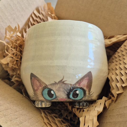 Hand-painted Cat Mug - Azuki - face up in a cardboard box