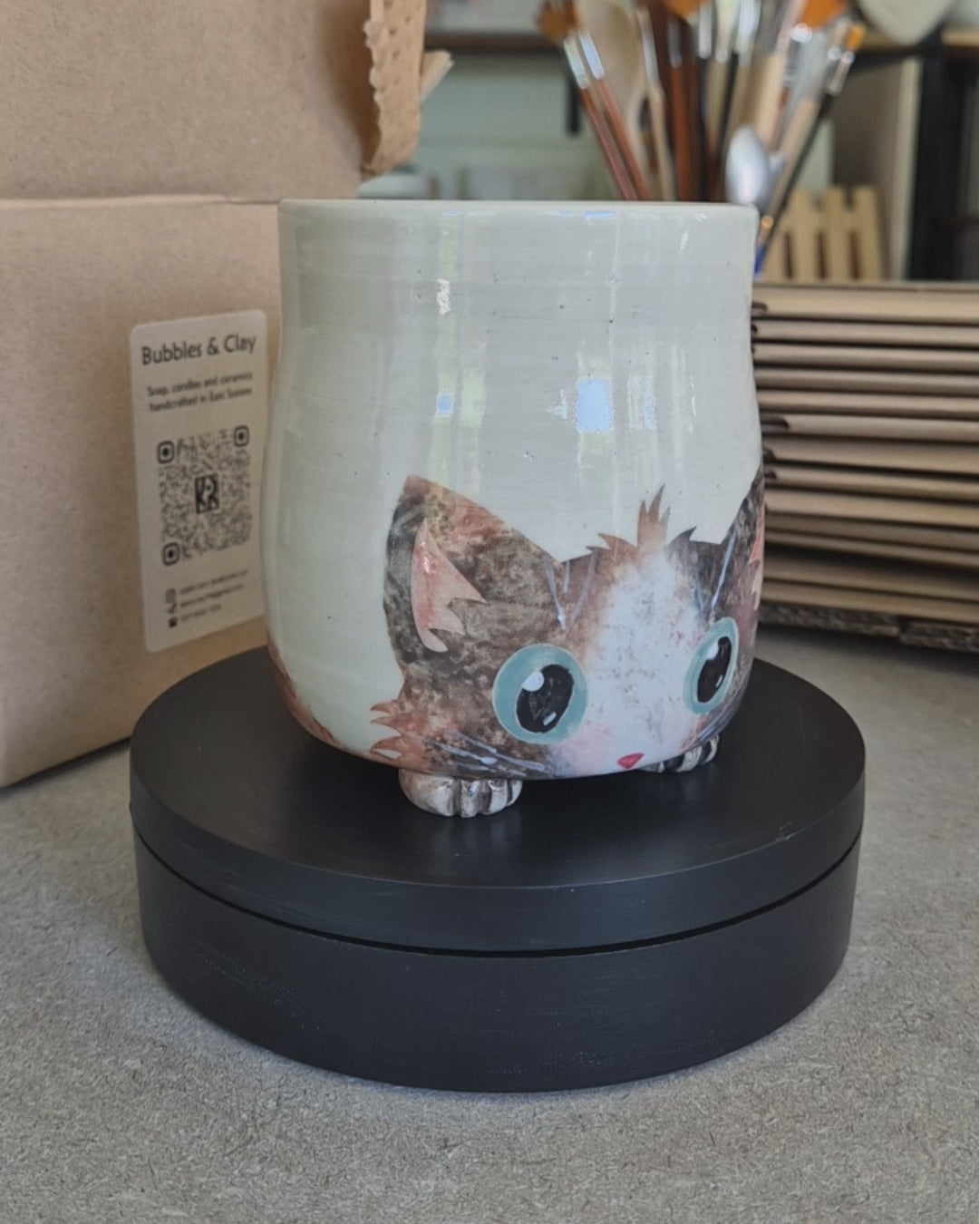 Video of Arlo the cat mug on a automatic turntable
